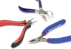 three pairs of pliers are shown with red, blue and white handles on them