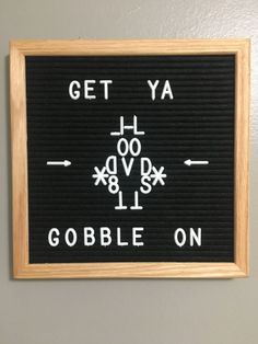 a black and white sign that says get ya gobble on