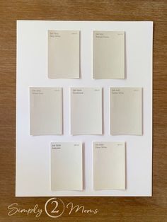 six swatches of white paint arranged on top of each other