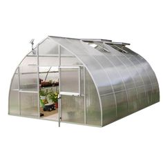 a green house with the door open