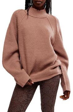 With roomy sleeves, a relaxed silhouette and turtleneck styling, this sweater is the ultimate in cozy-chic everyday wear. Turtleneck Long sleeves 58% cotton, 37% polyamide, 5% elastane Hand wash, dry flat Imported Cozy Turtleneck For Layering, Fall Relaxed Fit Turtleneck, Relaxed Fit High Neck Turtleneck For Fall, Fall Sweater With Funnel Neck And Relaxed Fit, Fall High Neck Relaxed Fit Sweater, Fall Funnel Neck Relaxed Sweater, Trendy Turtleneck Sweater For Loungewear, Relaxed Fit Turtleneck Sweater For Loungewear, Relaxed Fit High Neck Sweater For Fall