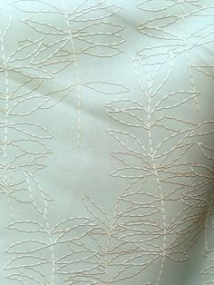 closeup of an upholstered fabric with white lines