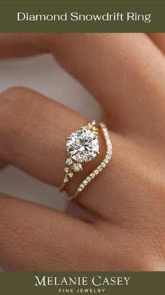 a woman's hand with a diamond engagement ring on her finger and the words, diamonds