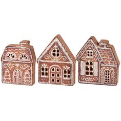 three small ceramic houses are shown on a white background, one is brown and the other is red