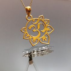 Om 18k 14k Real Solid Gold Necklace - Personalized Yoga Necklace - Floral Gold Ohm Necklace for women - Yoga Necklace ▶ 14K Solid Gold (585) ▶ 18K Solid Gold (750) ▶ Options: White,Rose,Yellow ▶ You can buy this necklace without chain. ▶ You can order 14k Real Gold ,18k Real Gold ABOUT NECKLACE Handmade with 14k/18k solid real gold . You can order this OM necklace with 3 different color options, 5 different necklace length options and free & express shipping to the all-around the world. What is Yellow Gold Plated Spiritual Necklace, Spiritual Yellow Gold Necklaces For Meditation, Yellow Gold Spiritual Necklaces For Meditation, Antique Gold Spiritual Necklace, Ohm Necklace, Yellow Spiritual Pendant Necklace, Om Necklace, Yoga Necklace, Solid Gold Necklace