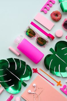 various items are arranged on a table including sunglasses, hair combs and other accessories