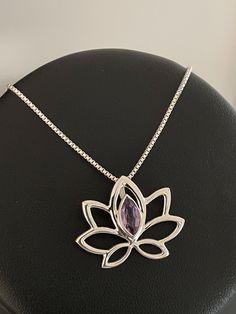 "GENUINE AMETHYST LOTUS NECKLACE, NATURAL AMETHYST PENDANT Minimalist Sterling Silver Natural Amethyst Lotus Jewelry NECKLACE FEATURES: Metal: All components are made from solid .925 Sterling Silver Model is wearing 16\" in length solid .925 Sterling Silver Chain Length available: 16\", 18\" or 20\" Measurement: Natural Amethyst Pendant Amethyst Gemstone 7MM x5MM Height: 29MM (1\") Width: 20MM (0.8\") Your Natural Amethyst Lotus Necklace will arrive in a gift box, beautifully wrapped and ready f Silver Amethyst Necklace For Meditation, Wedding Anklets, February Birthstone Jewelry, Sunshine Necklace, Pendant Minimalist, Silver Model, Lotus Jewelry, Lotus Necklace, Natural Gemstone Necklace