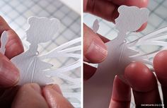 two pictures of someone cutting out some paper with scissors and glue on their fingers to make an angel ornament