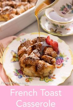 french toast casserole on a plate being drizzled with syrup