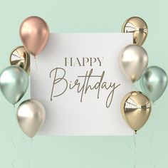 a happy birthday card with gold and silver balloons