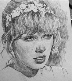 a pencil drawing of a girl with flowers in her hair and wearing a flower crown