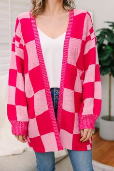 This cozy cardigan is going to make your day every time you throw it on! That checkered print is super trendy and we especially love it those fun colors! This cardigan will of course look great for Valentine's Day but it will also look great any day of the week! This cardigan features long sleeves, a knit fabric, and a checkered print. Material has a generous amount of stretch.Cam is wearing the small. Checkered Cardigan, Pink Checkered, Knit Wear, Checkered Print, Mint Julep Boutique, Pink Knit, Fall Day, Cozy Cardigan, Mint Julep