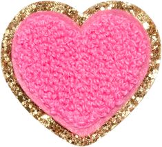 a pink heart with gold glitters on it