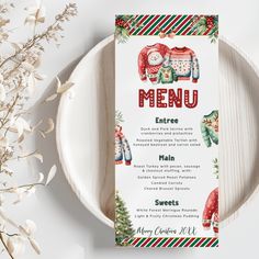 a christmas themed menu on a plate