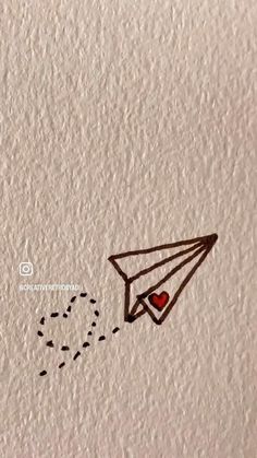 a drawing of a paper airplane with a heart in it's tail flying through the air