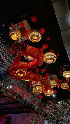 red and gold lanterns hanging from the ceiling