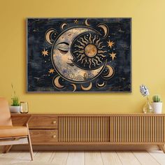 the sun and moon are depicted in this modern art piece, which is on display