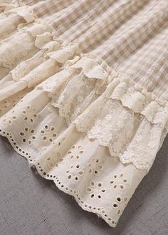 the skirt is made out of lace and fabric