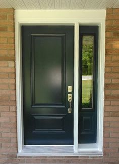 a black front door with two sidelights