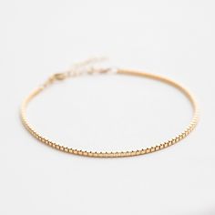 "Our dainty box chain necklace is the prettiest everyday bracelet to add to your collection. Made of 14k gold fill or sterling silver, making it perfect for everyday wear. Ready for gift giving! . . . . . . . . . . . . . . . . . . . . . . . . . . . . . . . . . . . . . . . . . . BRACELET + Bracelet length: 6.5\" with 1.5\" extender + 14k gold fill -or- sterling silver chain + 14k gold fill -or- sterling silver spring clasp & findings . . . . . . . . . . . . . . . . . . . . . . . . . . . . . . Affordable Dainty Round Chain Bracelet, Cheap Dainty Bangle Chain Bracelet, Affordable Adjustable Minimalist Gold Bracelet, Cheap Everyday Beige Bracelets, Cheap Adjustable Bracelets For Everyday Wear, Cheap Dainty Yellow Gold Bracelet, Affordable Gold Adjustable Chain Bracelet, Cheap Gold Adjustable Chain Bracelet, Cheap Gold Wrap Bracelet For Gift