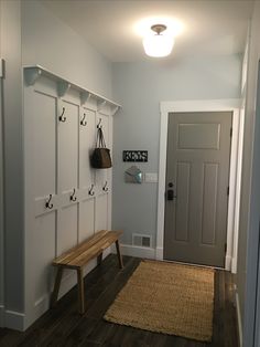 the entryway is clean and ready for guests to use it as a storage area