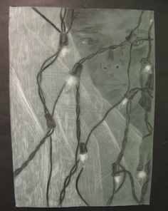 a drawing of a man's face with string lights on it