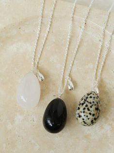 A super niche natural stone egg necklace! ~ Large three-dimensional egg-shaped white crystal spotted stone obsidian pendant With the classic 925 silver twist chain There is a cold niche design in the temperament. The pendant seems exaggerated. The upper body is invincible, fashionable and easy to match. Cheap Adjustable Large Pendant Jewelry, Egg Necklace Pendants, Black Onyx Crystal Necklace, Onyx Crystal Necklace, Egg Necklace, Stone Pendant Necklace, Niche Design, Unique Gemstones, 925 Silver Jewelry