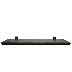 a wooden shelf with two black square brackets on the top and one metal bar at the bottom