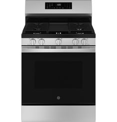 a stainless steel stove with the oven door open and its light on, against a white background