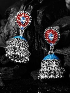 Oxidized Silver-Toned and Blue Enamelled Beaded Dome Shaped Jhumkas Secured with a post and back closure Size & Fit Length: 5 cm Material & Care Base Alloy: Alloy Stone Type: Artificial Stones and Beads Dispatch within 7 days Festive Oxidized Finish Round Jhumkas, Festive Blue Bohemian Jhumkas, Blue Oxidized Finish Earrings, Festive Metal Jhumkas With Oxidized Finish, Festive Ceremonial Oxidized Finish Earrings, Artificial Stone, Jhumka Earrings, Oxidized Silver, Bollywood Fashion