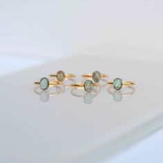 Our blue flash labradorite ring is handmade with genuine labradorite stone in an oval shape in 18k gold vermeil over 925 sterling silver. An everyday classic ring with a touch of modern, you will never regret investing in or gifting to your loved ones. Securely set in our sleek and sturdy four prong setting. D E T A I L S * Stone - 6mm x 8mm Dark Blue Flash * Band - 2mm * Material: 18k gold vermeil over 925 sterling silver, genuine labradorite stone * All pics are taken in natural day light with Labradorite Rings, Never Regret, Labradorite Ring, Labradorite Stone, Moonstone Ring, Classic Ring, Blue Rings, Amethyst Ring, Handmade Ring