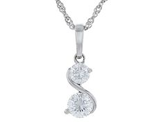 Moissanite Fire® .93ctw diamond equivalent weight round brilliant, Platineve® two stone pendant with 18 inch Singapore chain. Pendant measures approximately 3/4" L x 1/4" W. Chain has a lobster clasp and a two inch extender. Actual moissanite weight is .83ctw. Diamond White Three-stone Cubic Zirconia Necklace, Diamond White Cubic Zirconia Three Stone Necklace, Diamond White Three Stone Diamond Necklace, Three Stone Cubic Zirconia Diamond Necklace, Cubic Zirconia Jewelry With Tension Setting, White Gold Three Stone Round Cut Diamond Necklace, Three Stone Round Cut White Gold Diamond Necklace, Cubic Zirconia Round Pendant With Tension Setting, Chain Pendant