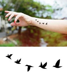 a woman's arm with birds on it and the word love written in black ink