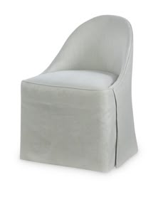 an upholstered chair with white fabric