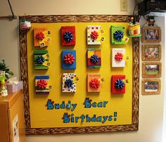 a bulletin board with magnets on it that says buddy bear birthday