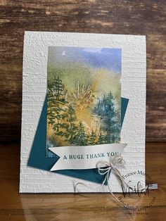 a handmade thank you card with an image of trees