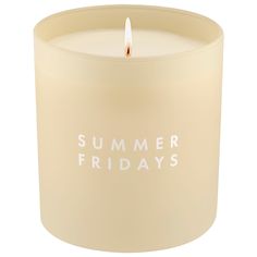 a candle with the words summer friday's written on it in white lettering,