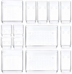 six clear plastic trays with holes on each side and four rows of holes in the middle