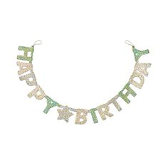 the word happy birthday spelled in glitter letters on a green and gold necklace with white beads