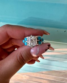 Our new cut in the mossanite rings we have!! Our Everlasting Love has a beautiful Cushion Cut stone along with six square cut turquoise stones!!! I'm in love with this ring!!! Please give us a few weeks to get this perfectly made for you, they are custom! New Cut, Everlasting Love, I'm In Love, Turquoise Stones, Square Cut, Love Ring, Native American Jewelry, Cushion Cut, Turquoise Stone