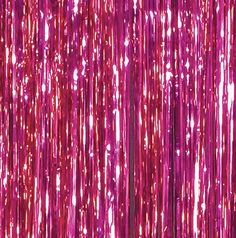 pink tinsel hanging from the ceiling in front of a wall with many lights on it