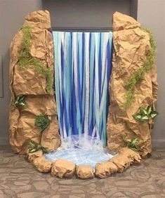 a fake waterfall is in the middle of a room