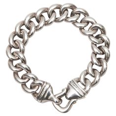 Sterling silver large buckle chain-link bracelet by David Yurman. 0.5" width, 7.25" length.