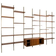 a wooden shelf with several shelves on it