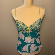 Ongossamer Cropped Turquoise Bralette Turquoise Size M/L Turquoise Floral Print Tops For Beach, Turquoise Floral Print Top For Summer, Turquoise Floral Print Tops For Summer, Light Blue Fitted Tank Top For Vacation, Fitted Turquoise Tops For Spring, Turquoise Sleeveless Top For Vacation, Green Floral Print Camisole Top, Fitted Turquoise Tops For Beach, Casual Turquoise Top For Beach Season