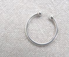 Very simple, this open silver ring ends with 2 small 3 mm balls with a 1.5 mm thick round wire. Feminine, suitable for everyone and can be combined with another ring. Adjustable from size 50 to size 54 Possibility of ordering other sizes with a longer lead time. Contact me Guaranteed anti-allergic 925/1000 silver (nickel-free) in the United States. Open Ring, Lead Time, Silver Ring, For Everyone, Jewelry Rings, Etsy Accessories, Silver Rings, Gift Card, Thing 1