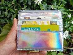 "Holographic card case, Card Holder Wallet, Hologram card holder, metallic This is a  passport cover made of Holographic vinyl. It's perfect travel  gift for someone looking for a unique gift for girlfriend, mother, sister or yourself. boyfriend. brother Size  3.8 \" x 5.5 \" Material: Holographic faux leather Please feel free to contact me if you have any questions!" Trendy Card Holder With Interior Slots For Gift, Trendy Card Holder With Interior Slots As Gift, Trendy Rectangular Card Holder Gift, Trendy Rectangular Card Holder As Gift, Silver Rectangular Card Holder For Gift, Silver Rectangular Card Holder Gift, Unique Gifts For Girlfriend, Holographic Bag, Holographic Vinyl