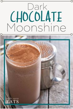 a drink in a glass with chocolate on top and the words dark chocolate moonshine above it