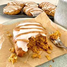 a piece of cake sitting on top of a brown paper