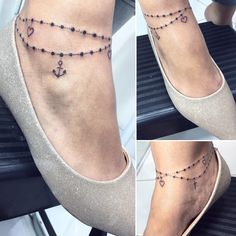 a woman's foot with an anchor and heart tattoo on it